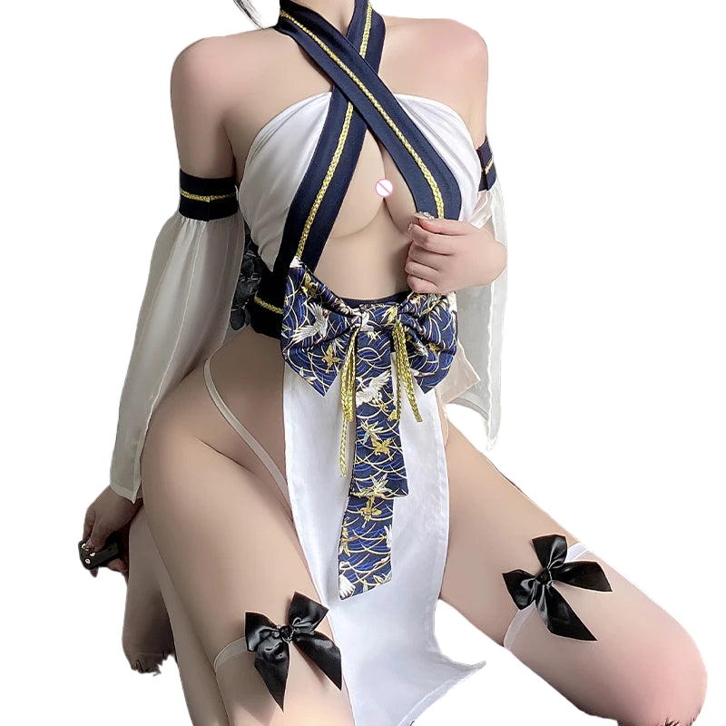 Person wearing a revealing outfit with suspenders and black bows on a neutral background