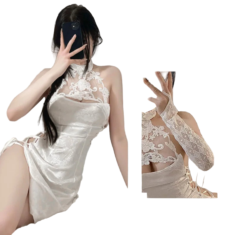 Woman wearing a white lace dress with a close-up inset, set against a neutral background.