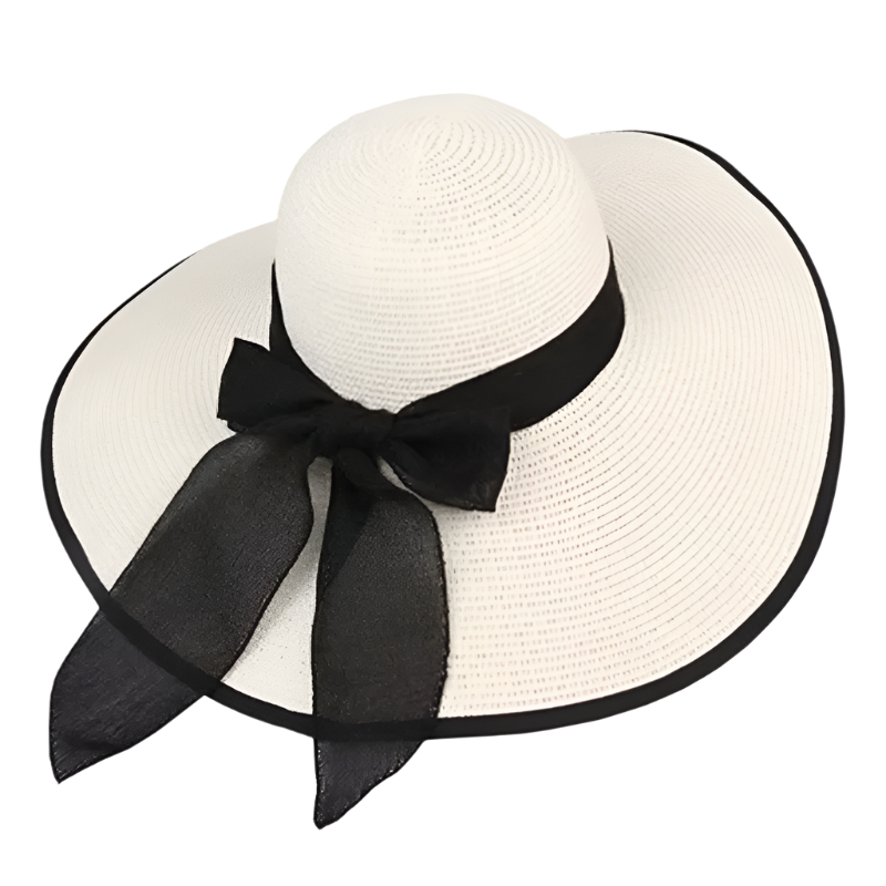 White straw hat with a black ribbon on a white background