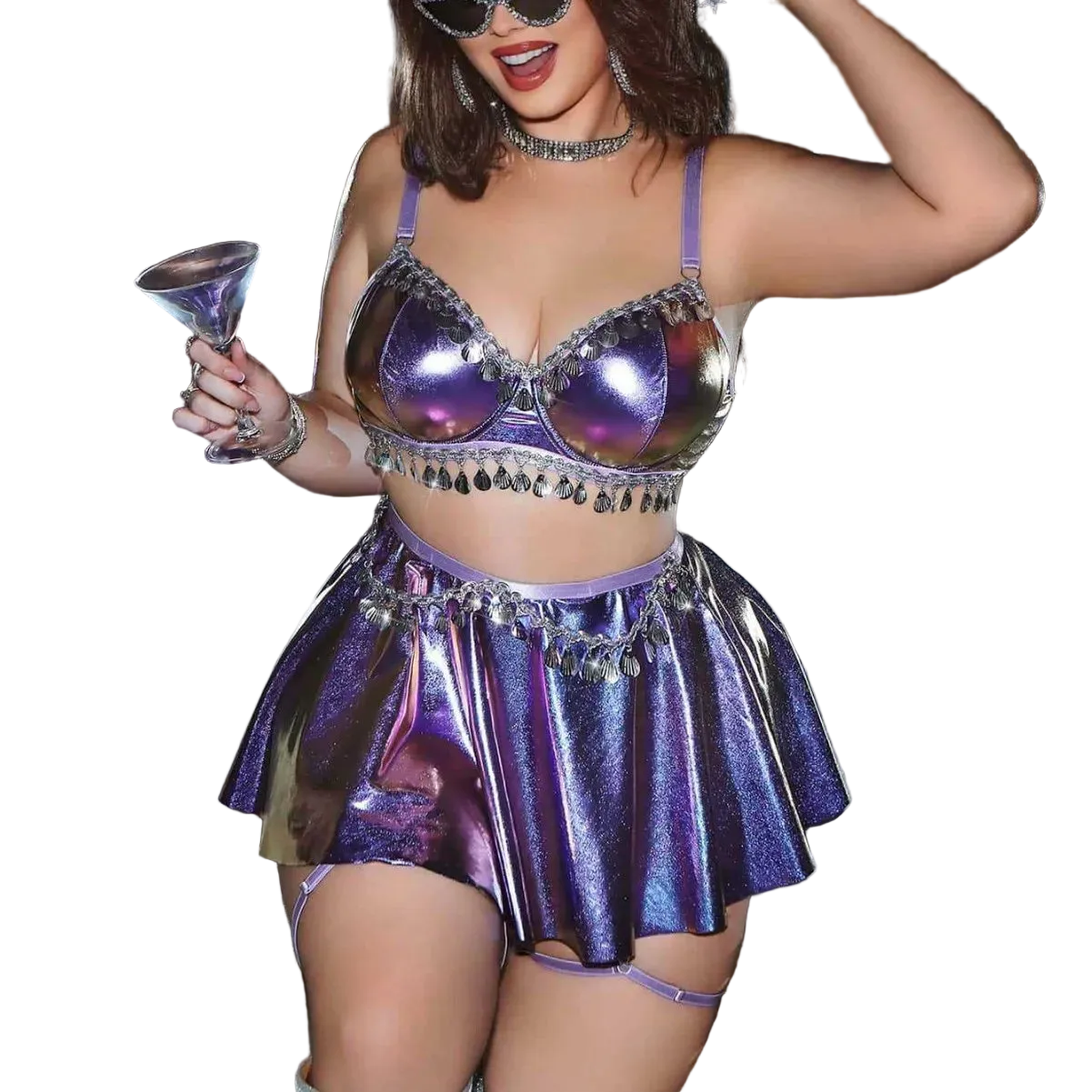 Person wearing a shiny purple outfit with a mirror and disco ball in the background