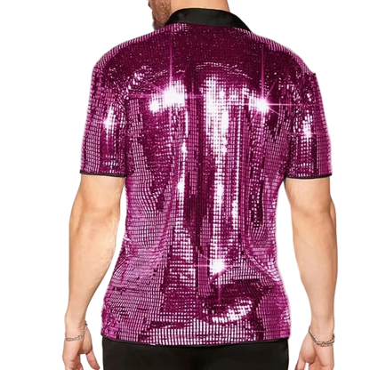 Person wearing a sparkling purple sequin shirt on a plain background