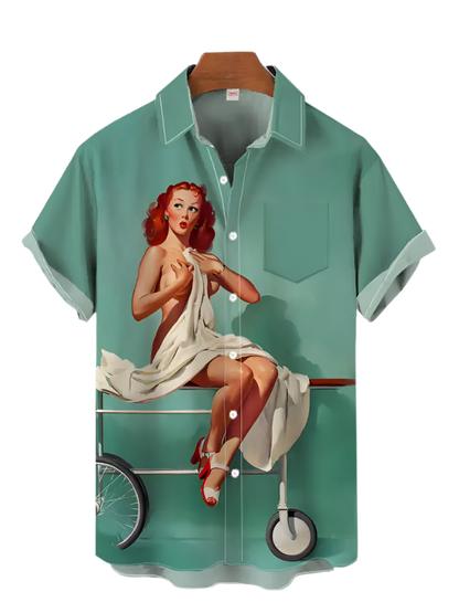 Green shirt with a graphic of a woman on a bicycle on a white background