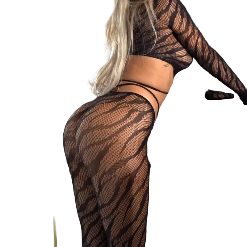 Person wearing fishnet stockings sitting on a car.