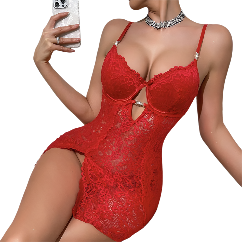 Person wearing a red lace lingerie set sitting on a white couch.