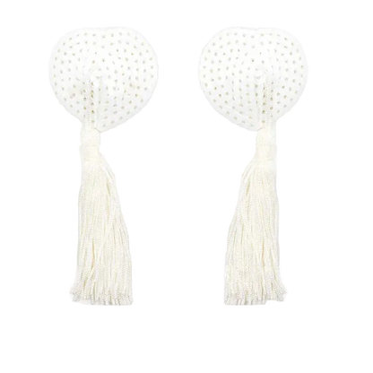 Pair of white beaded earrings with tassels on a white background