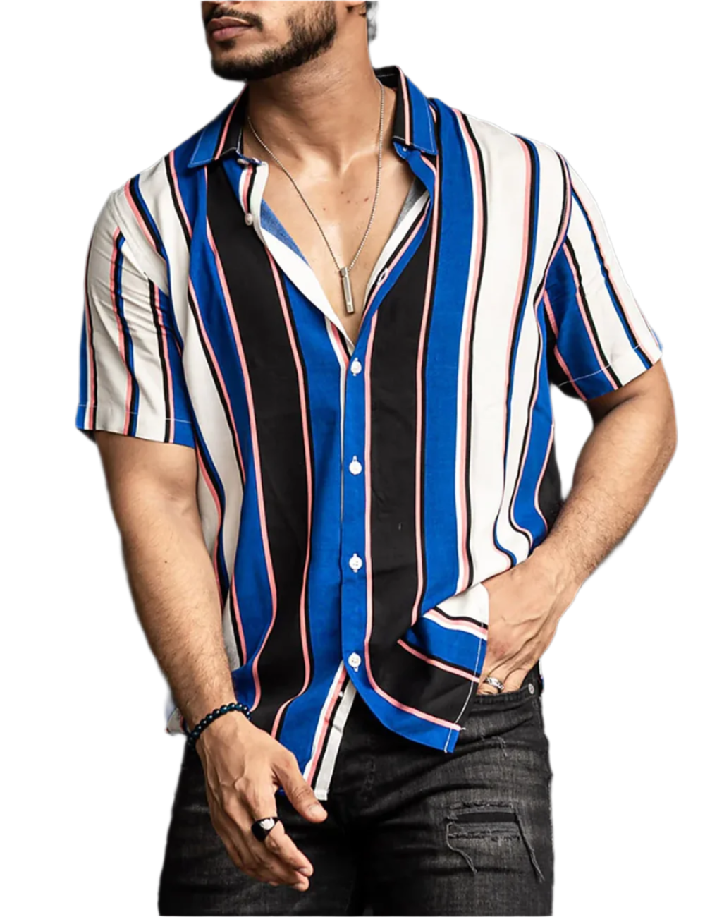 Man wearing a colorful striped shirt against a dark background