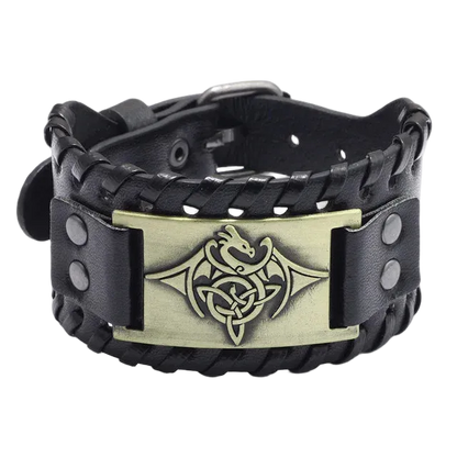 Black leather bracelet with a gold emblem featuring a dragon design on a white background