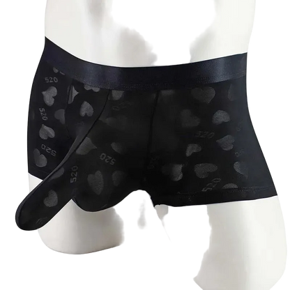 Black boxer briefs with heart patterns on a mannequin against a white background