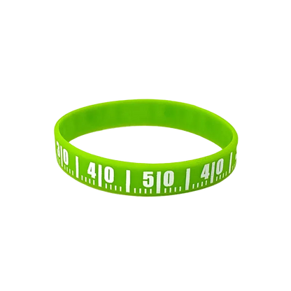 A bright lime green silicone wristband featuring white printed measurement markings in increments of 4 and 5, shown on a plain white background.