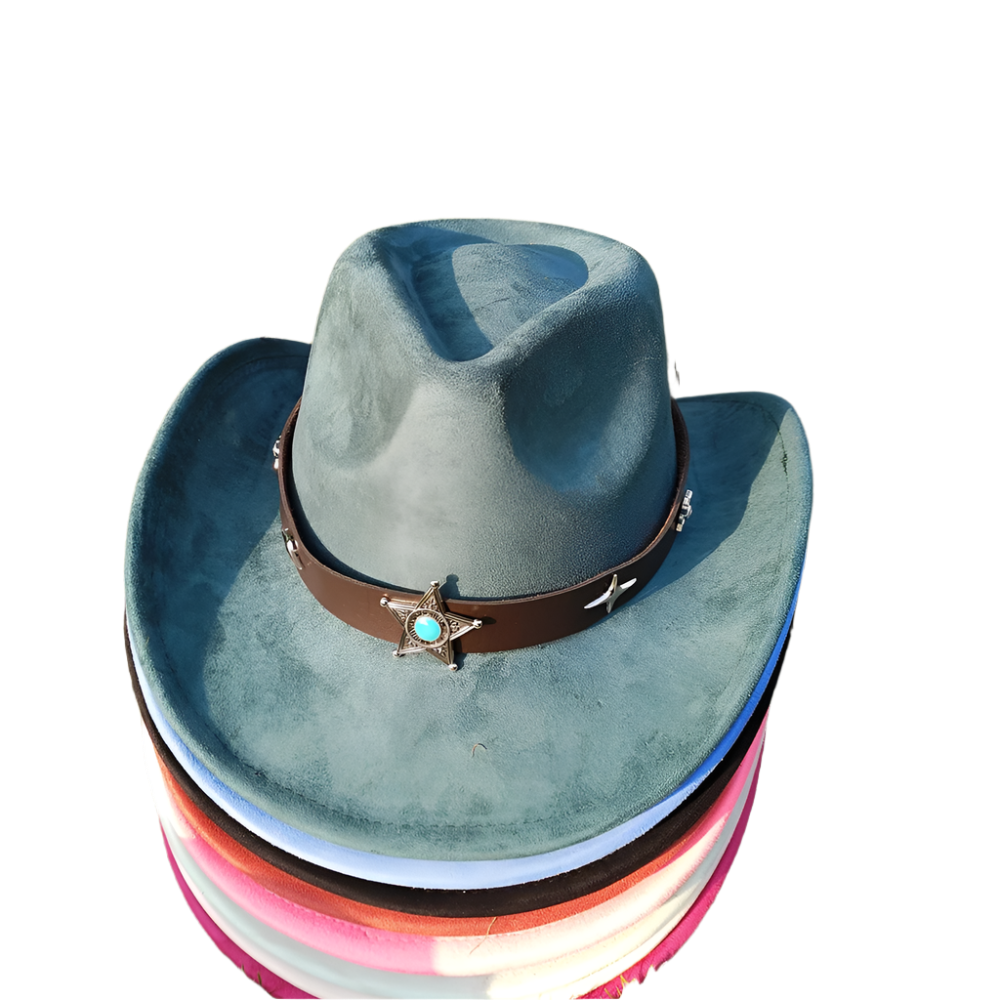 Stack of blue cowboy hats with decorative band on grass