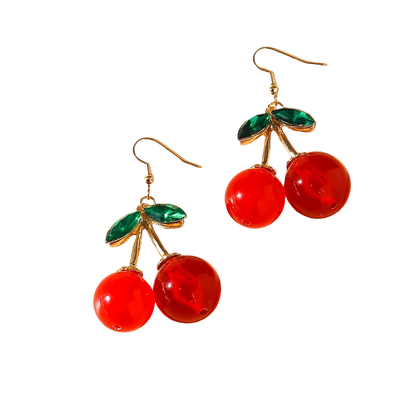 Cherry-themed earrings on a beige background
