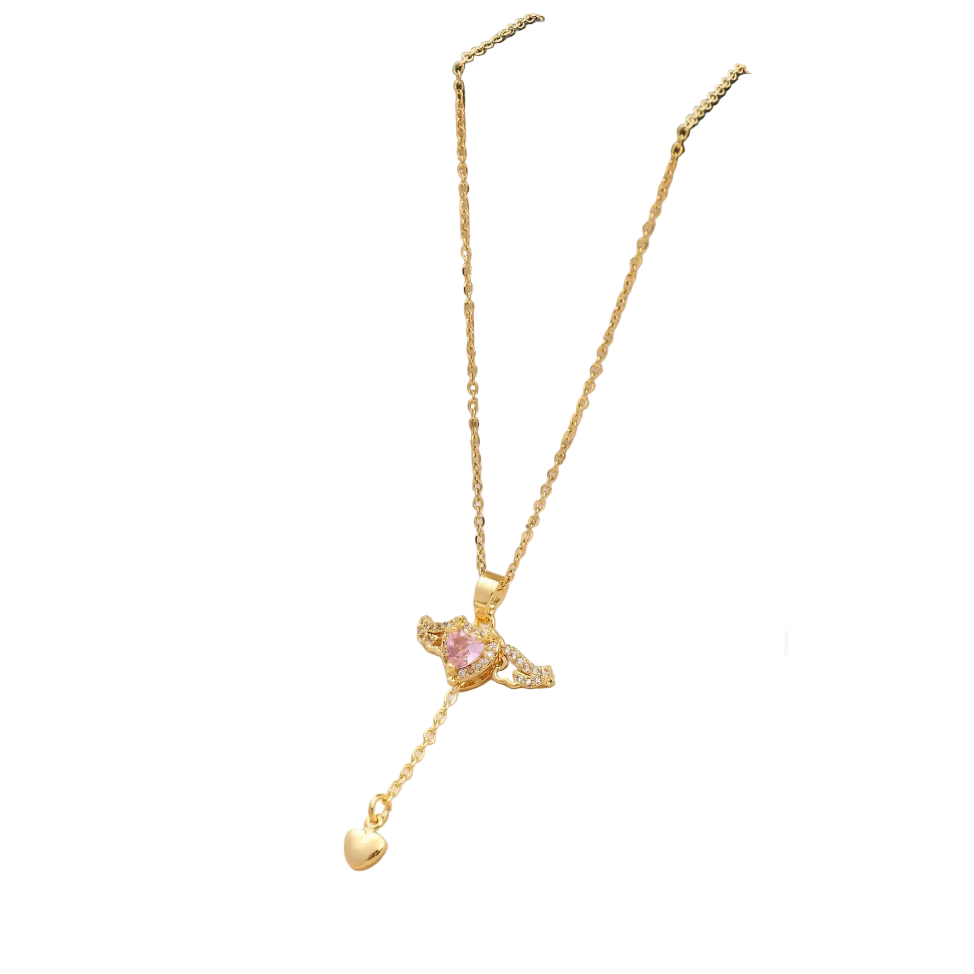 Gold necklace with a heart pendant in an open green jewelry box on a beige fabric background