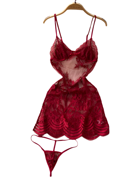 Red lace lingerie set on a hanger against a textured white surface with floral decorations.