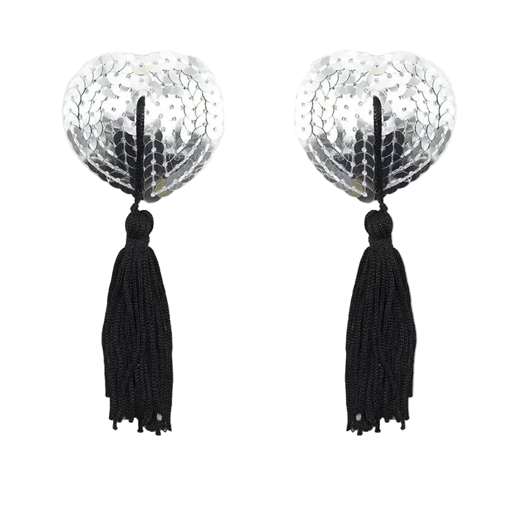 Pair of earrings with silver circular designs and black tassels on a white background