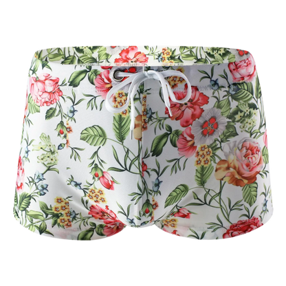 Floral-patterned boxer briefs with tropical leaf and flower design.