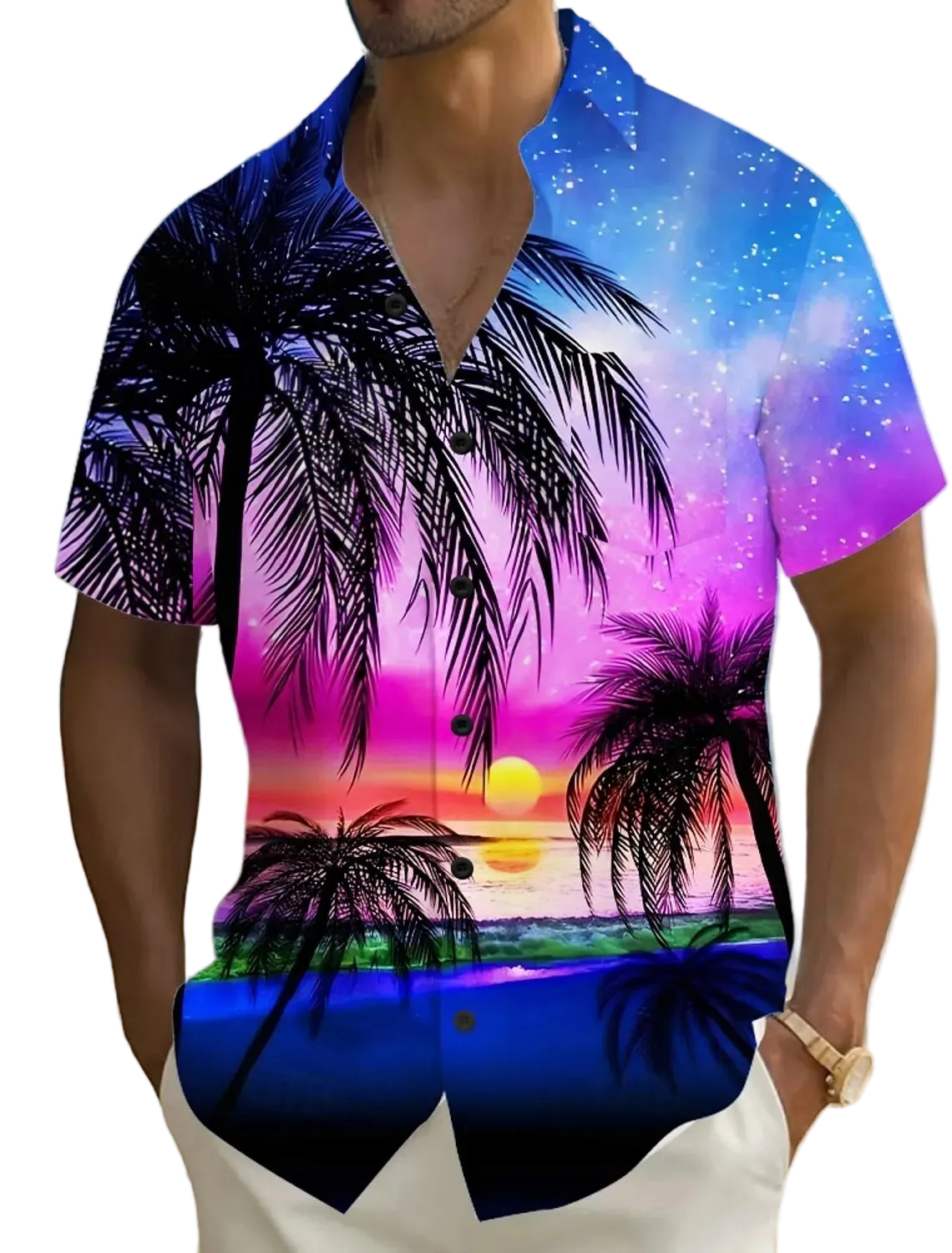 Person wearing a colorful beach-themed shirt with palm trees and sunset design on a beach.