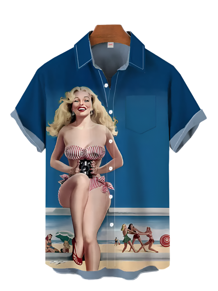 Blue shirt with a vintage-style graphic of a woman on a beach