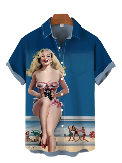 Blue shirt with a vintage-style graphic of a woman on a beach