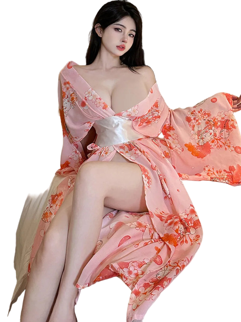 Woman in a floral dress sitting on a bed