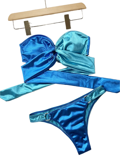 Blue bikini with ring details, perfect for stylish beachwear at the resort