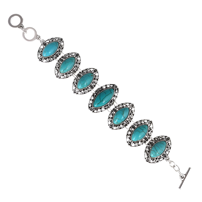Bracelet with turquoise stones and silver accents on a white background