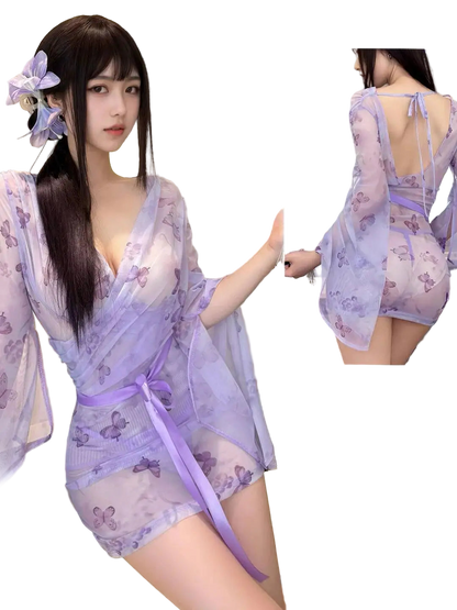 Woman wearing a purple floral nightgown with a mirror reflection showing the back design.