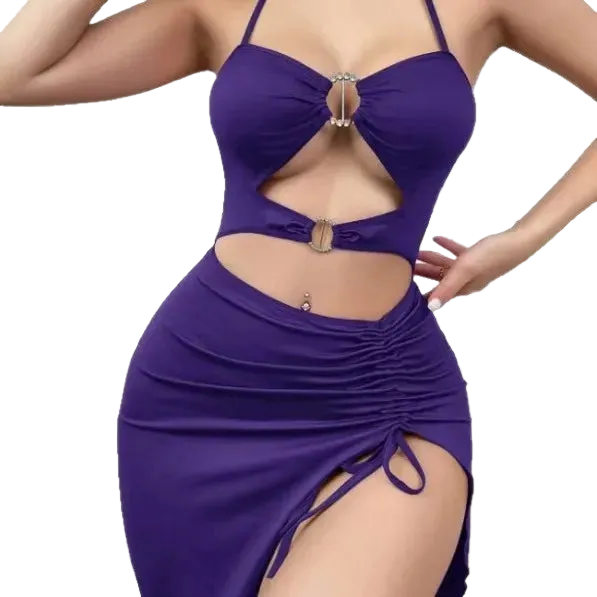 A woman wearing a purple cutout halter bikini top and matching ruched high-slit skirt set, shown against a plain white background.