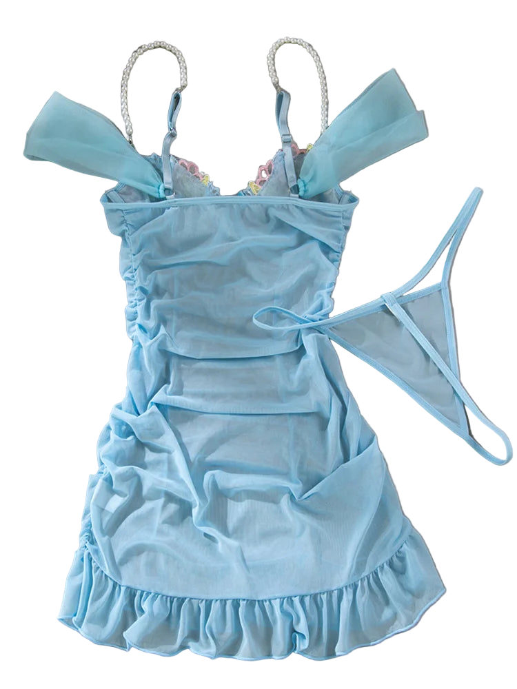 Light blue babydoll dress with ruffled details on a gray background