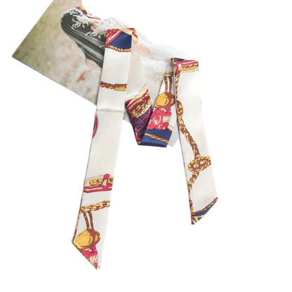 Colorful patterned scarf on a white surface