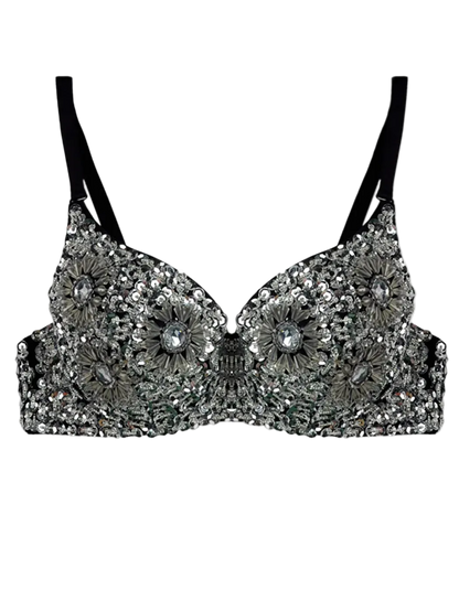 An embellished underwire bra with intricate silver sequins and floral beadwork, featuring black adjustable shoulder straps, shown against a plain white background.