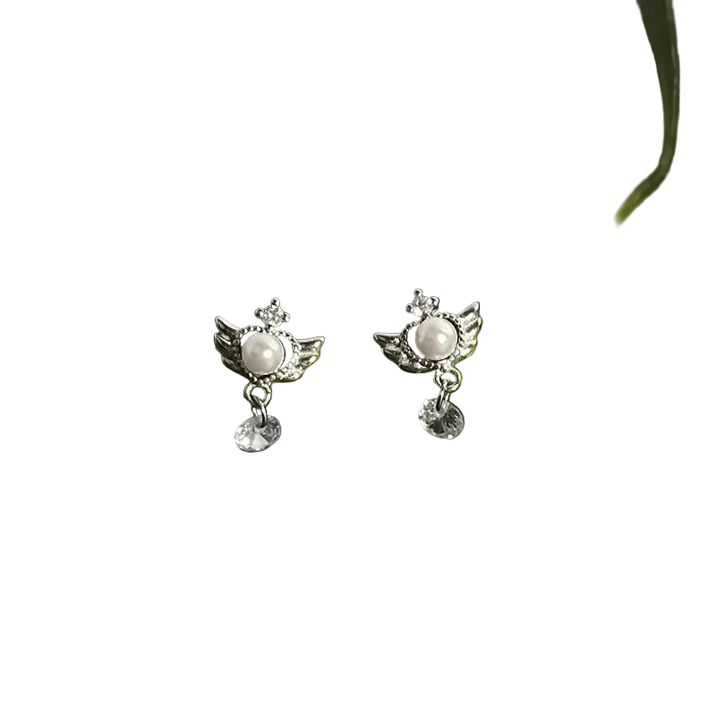 Pair of silver earrings with a central gemstone on a green stem against a dark background