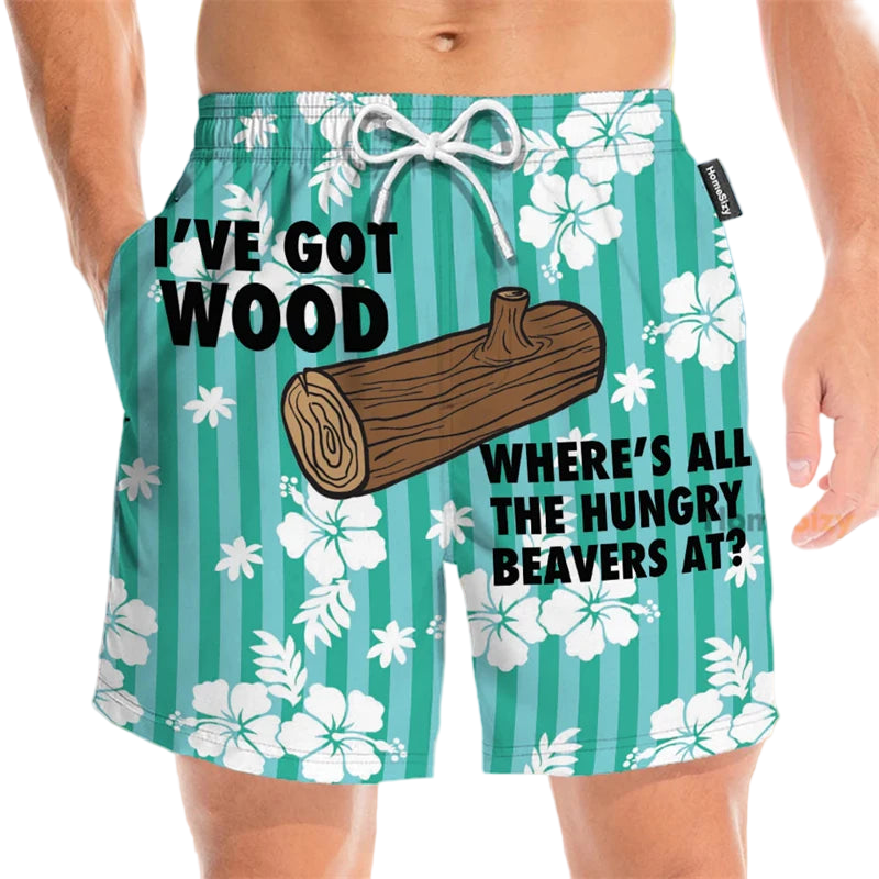 Beach shorts with a humorous design and text on a floral background.