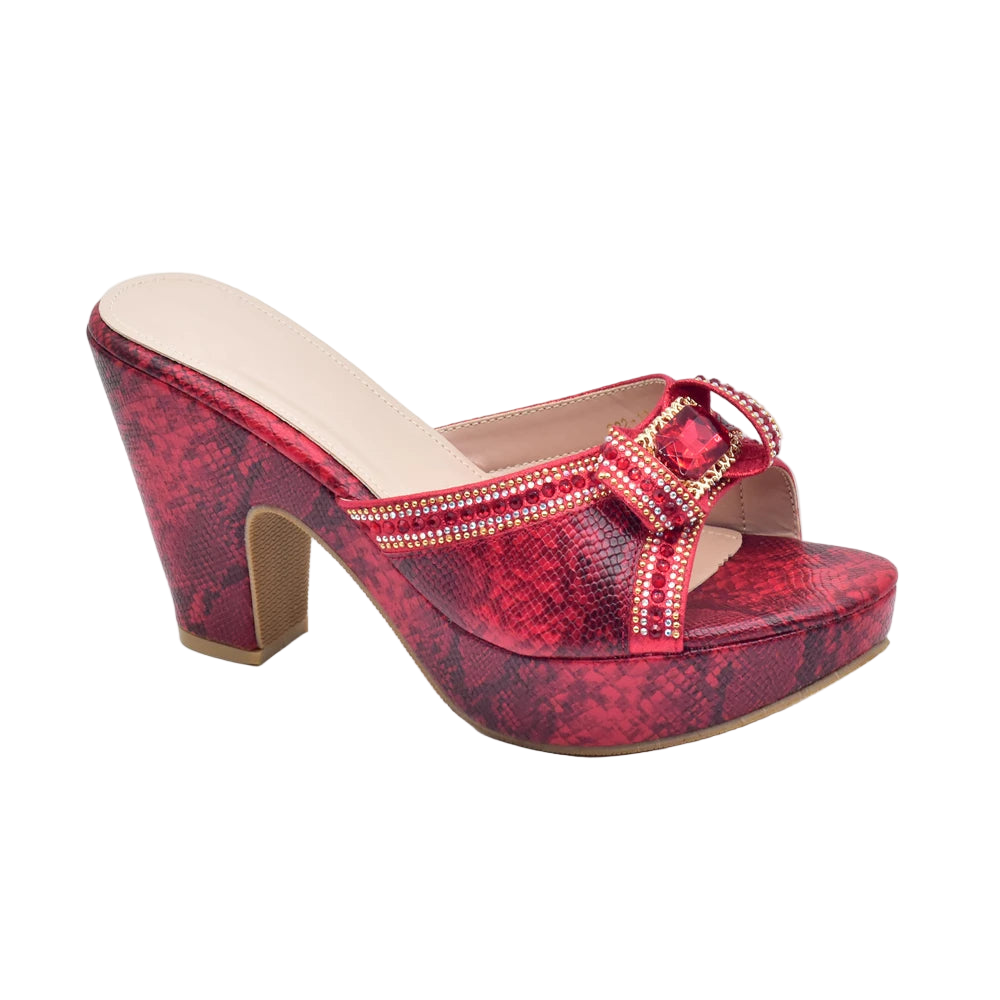 Red platform sandal with embellishments on a white background