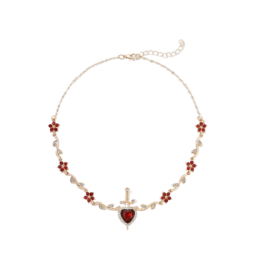 Necklace with heart-shaped pendant and floral elements on a white background
