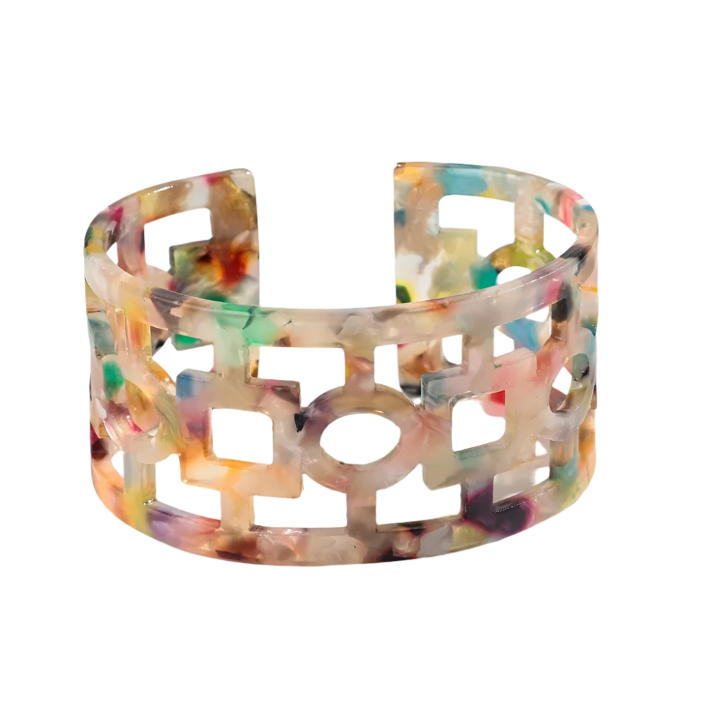 Bold leopard print wide cuff bangle featuring hollow geometric patterns and premium resin design for resort wear and theme nights

