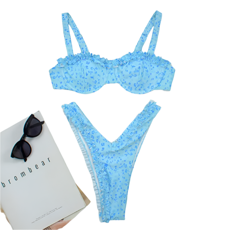 A vibrant bikini set with a blue floral pattern and pink ruffle trim. The top has structured cups and adjustable straps, while the bottom features a high-cut design.