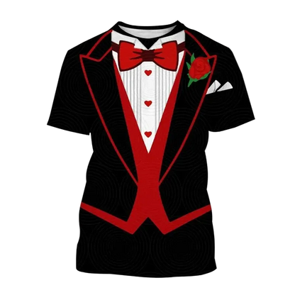 A black short-sleeve t-shirt with an all-over tuxedo print, featuring a red bow tie, red vest, red lapels, a white striped shirt, red heart details, and a red rose boutonniere. The word 'Red' is written in red text in the top-left corner.