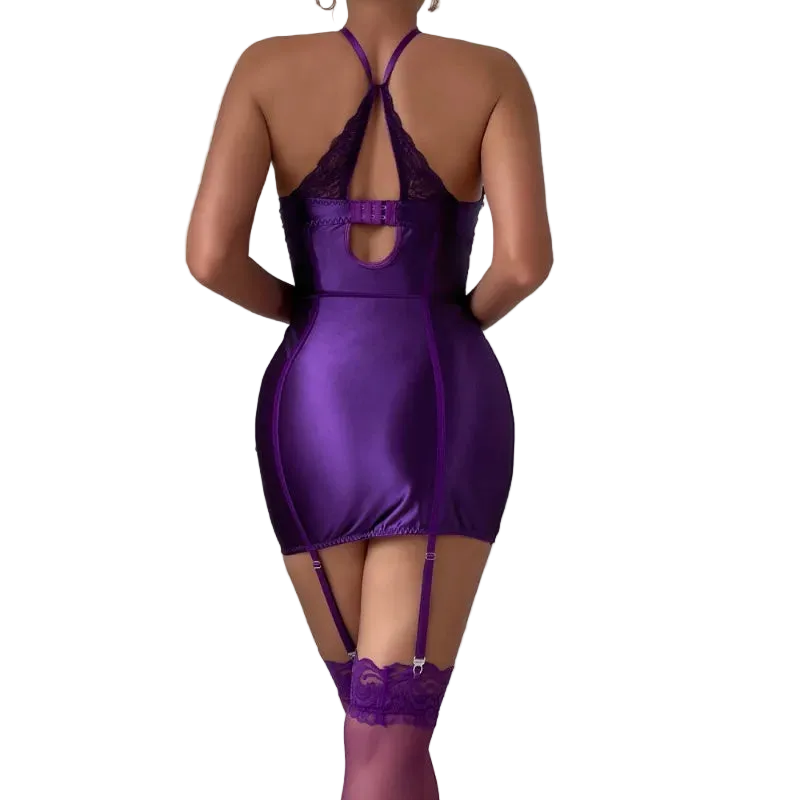 Purple lingerie set with lace details on a plain background