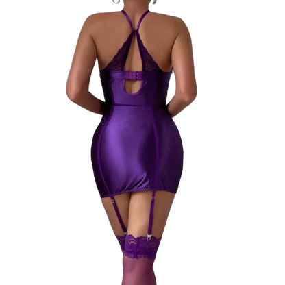 Purple lingerie set with lace details on a plain background