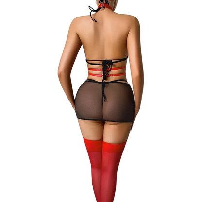Rear view of a model wearing sheer black mesh thong underwear with red strappy accents at the back, paired with red thigh-high stockings, against a plain light gray wall.