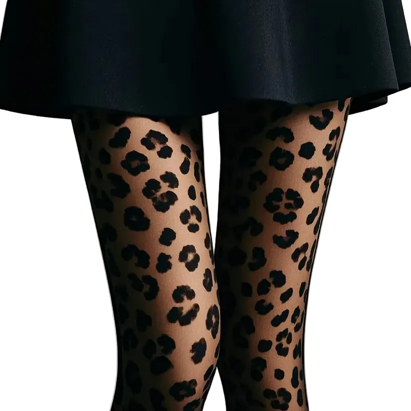 Close-up of a person's legs wearing sheer black leopard-print tights, paired with a dark skirt against a plain light gray background.