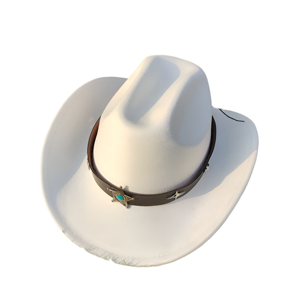 White cowboy hat with a brown band featuring a turquoise stone on grass