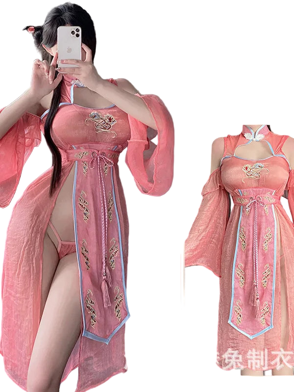 Person wearing a traditional pink embroidered dress with a close-up inset, set against a neutral background.