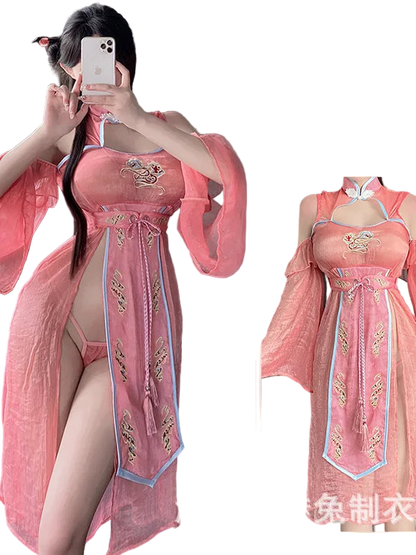 Person wearing a traditional pink embroidered dress with a close-up inset, set against a neutral background.