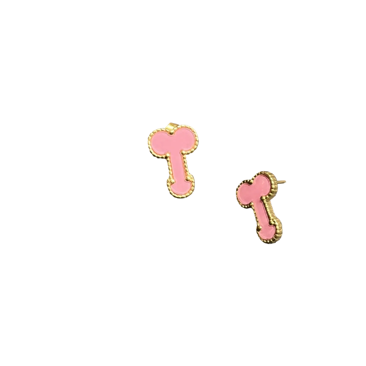 A pair of small bone-shaped stud earrings in pink enamel with gold-tone metal borders, displayed on a textured black surface.