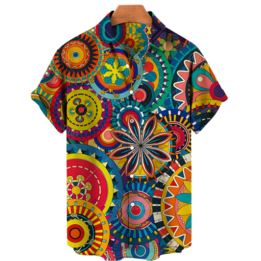  a vintage shirt with a short sleeve design, featuring a colorful and intricate pattern of abstract geometric shapes and floral motifs in bright hues of red, blue, yellow, and green.