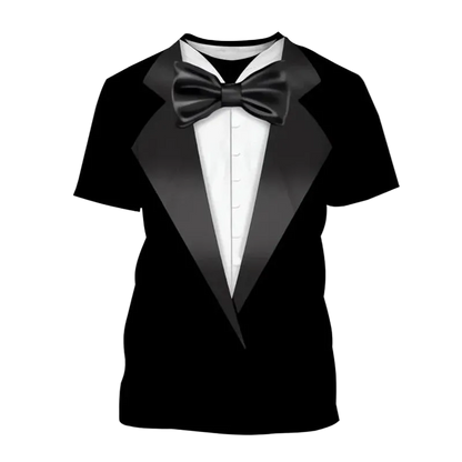 A black short-sleeve t-shirt printed with a tuxedo design, featuring a white shirt, black satin lapels, and a black bow tie. The word 'Green' is written in green text in the top-left corner, likely indicating a color variant.
