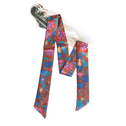 Colorful floral-patterned tie on a white background