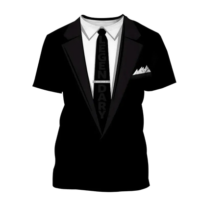 A black short-sleeve t-shirt with a graphic print of a tuxedo jacket, white dress shirt, black tie, and a white pocket square. The tie features the word 'LEGENDARY' printed vertically.