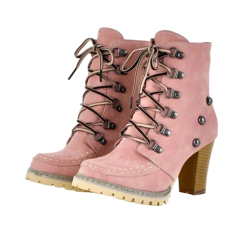 Pink lace-up boots with brown laces and buttons on a white background